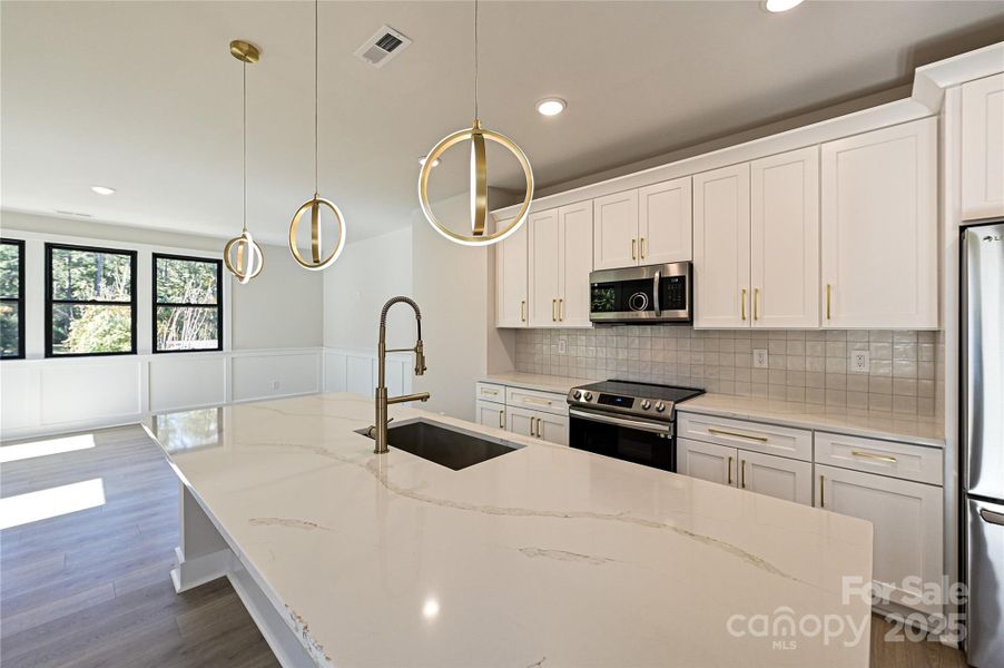 Furnished interior view inside a new home in , Charlotte (Image 4). Furnished interior view inside a new home in , Charlotte (Image 4).