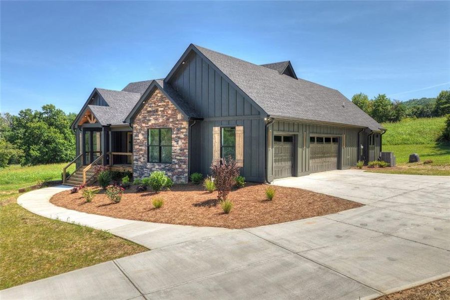 Front exterior of a new home in , Morganton, GA, highlighting curb appeal (Image 22).