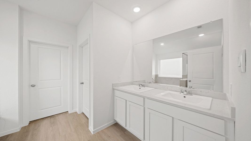 Furnished interior view inside a new home in Sunterra Lakes, Brookshire (Image 8).