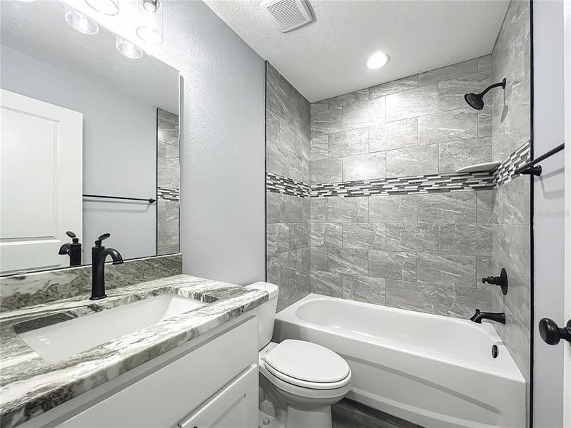 Furnished interior view inside a new home in , Lake Panasoffkee (Image 9).