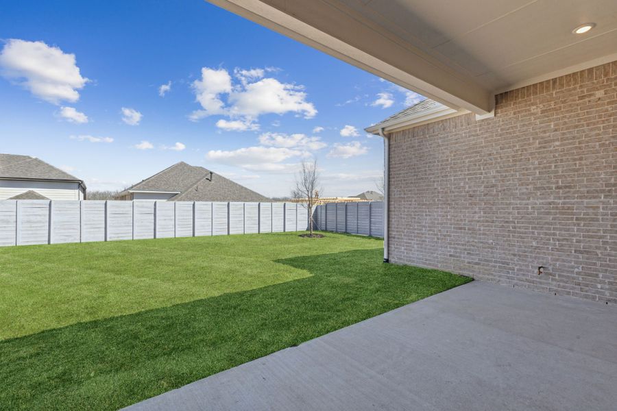 Exterior details and patio area of a home in Painted Tree Lakeside, McKinney (Image 4).