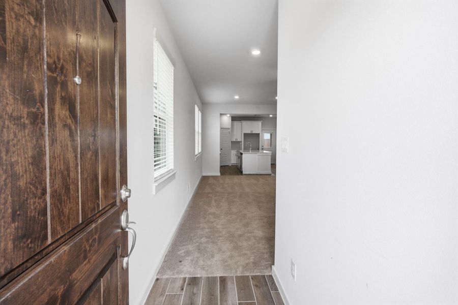 Spacious, unfurnished interior of a new home in , Iowa Colony (Image 39).