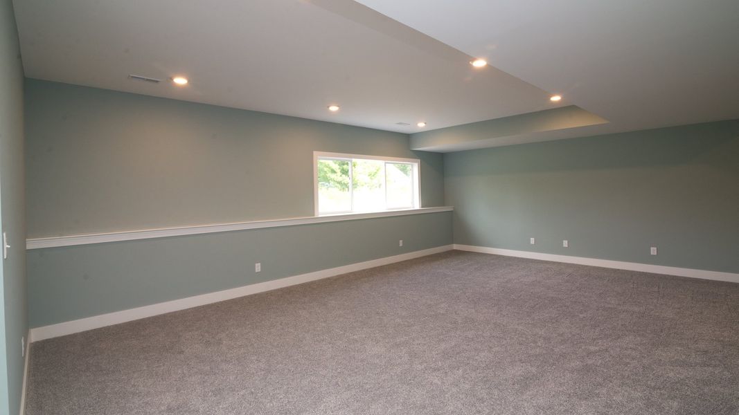 Representative unfurnished interior of a home built from the The Hartland by Norfolk Homes in Coronado Estates, Jackson (Image 63).