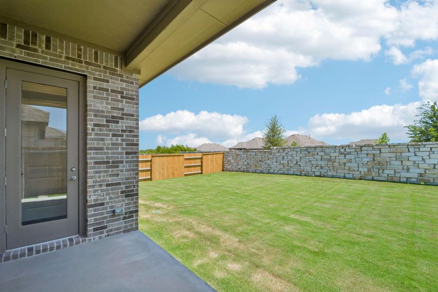 Exterior details and patio area of a home in 6 Creeks, Kyle (Image 22).
