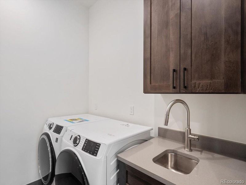Upper level laundry room Upper level laundry room