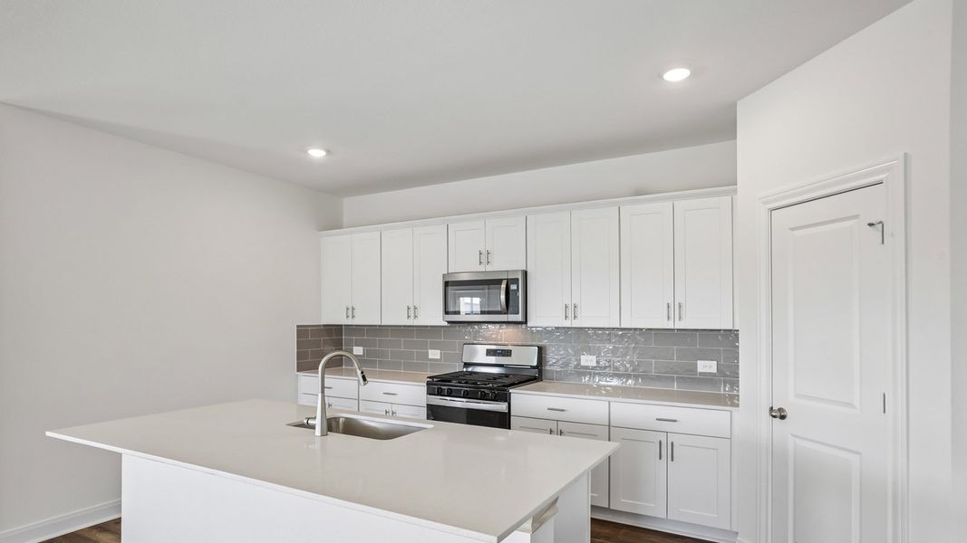 Furnished interior view inside a new home in Railhead, Cedar Creek (Image 5).