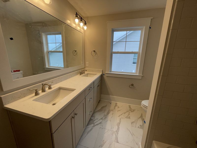 Furnished interior view inside a new home in The Sanctuary at Sunset Beach, Sunset Beach (Image 14).