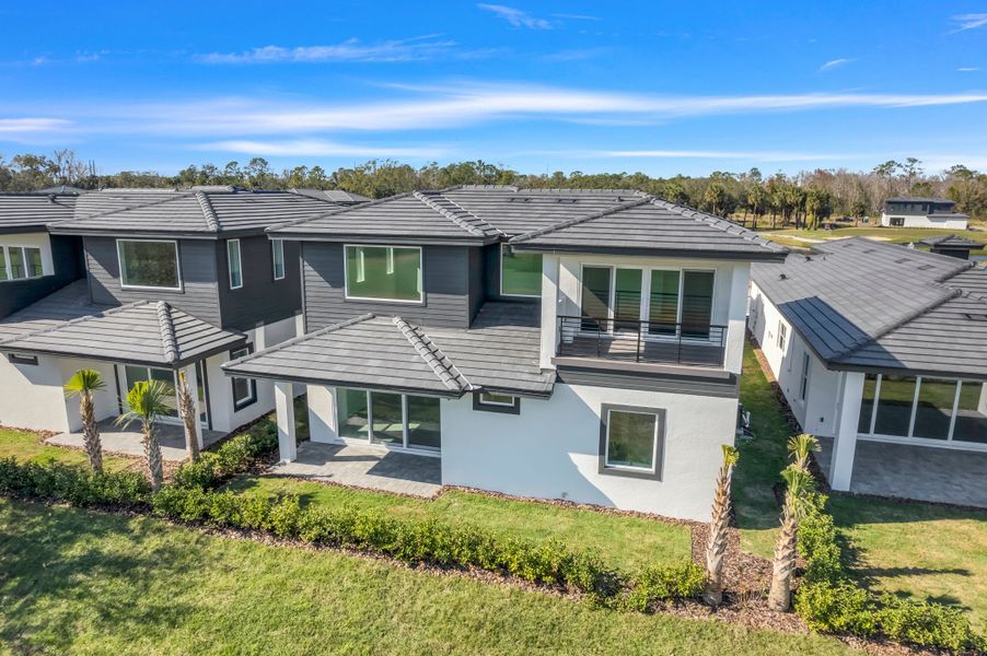 Representative exterior photo of a completed home built from the Courtyard 50 by ABD Development in Hampton Green at Providence, Davenport, FL (Image 26).