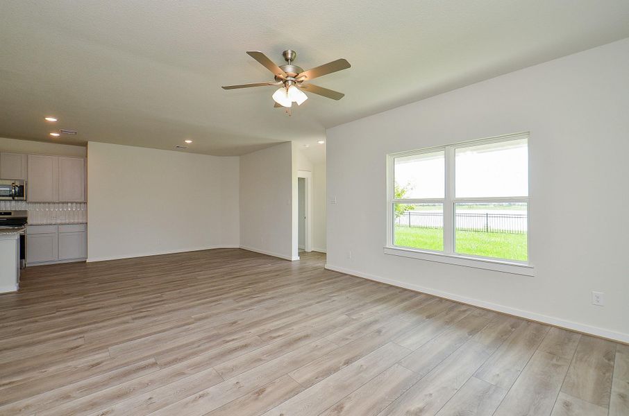 Spacious, unfurnished interior of a new home in Sunterra, Katy (Image 14).