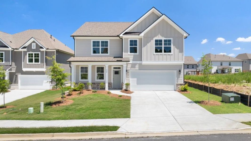 Front exterior of a new home in Hamptons at Riverwood South, Dallas, GA, highlighting curb appeal (Image 1). Front exterior of a new home in Hamptons at Riverwood South, Dallas, GA, highlighting curb appeal (Image 1).