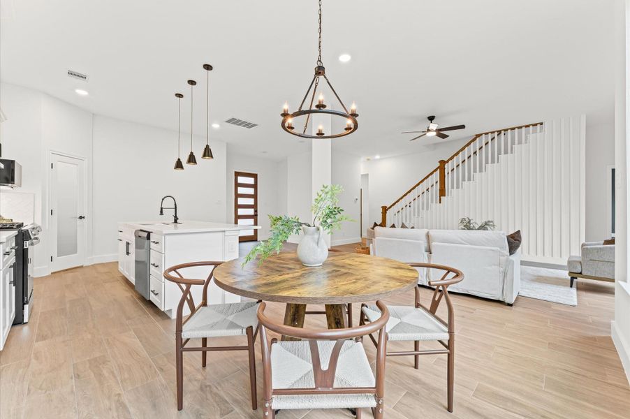 Bright and airy dining space overlooking the backyard, ideal for family meals and gatherings, with modern lighting and open views to the kitchen and living room. Bright and airy dining space overlooking the backyard, ideal for family meals and gatherings, with modern lighting and open views to the kitchen and living room.