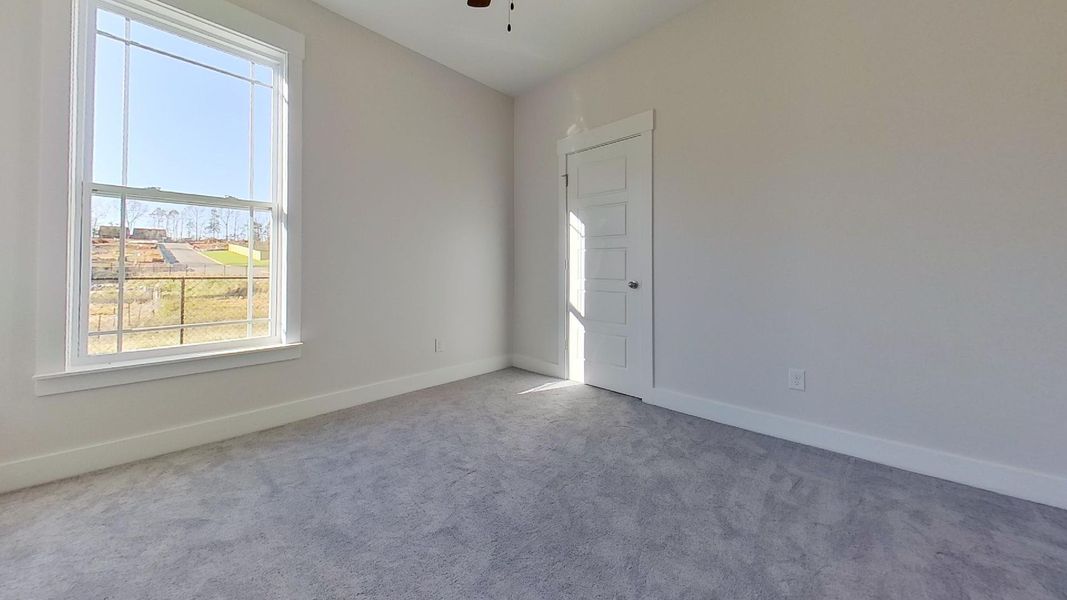 Representative unfurnished interior of a home built from the Addington by Enchanted Homes in Davis Heights, Inman (Image 24).