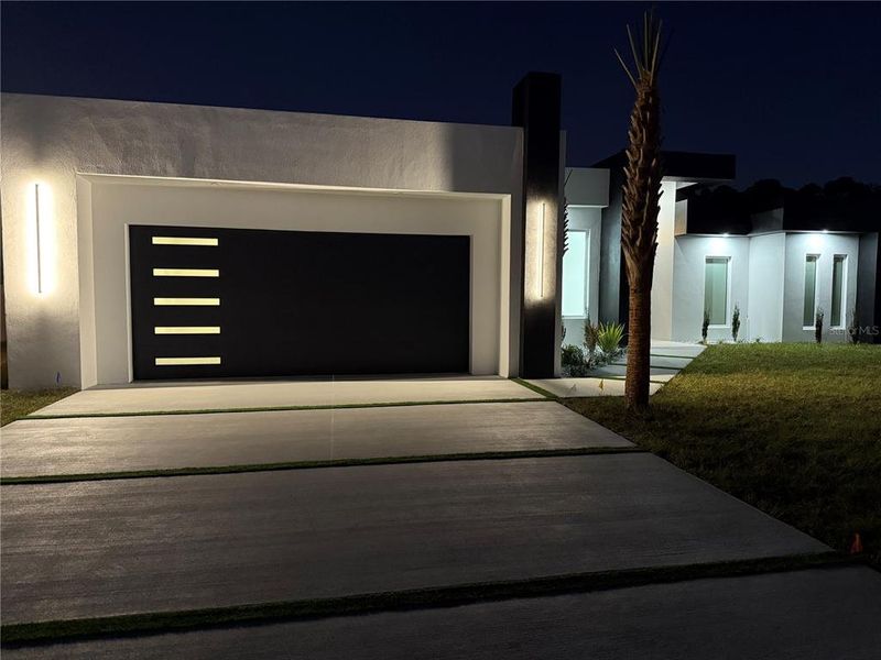 Front exterior of a new home in , Palm Coast, FL, highlighting curb appeal (Image 24).