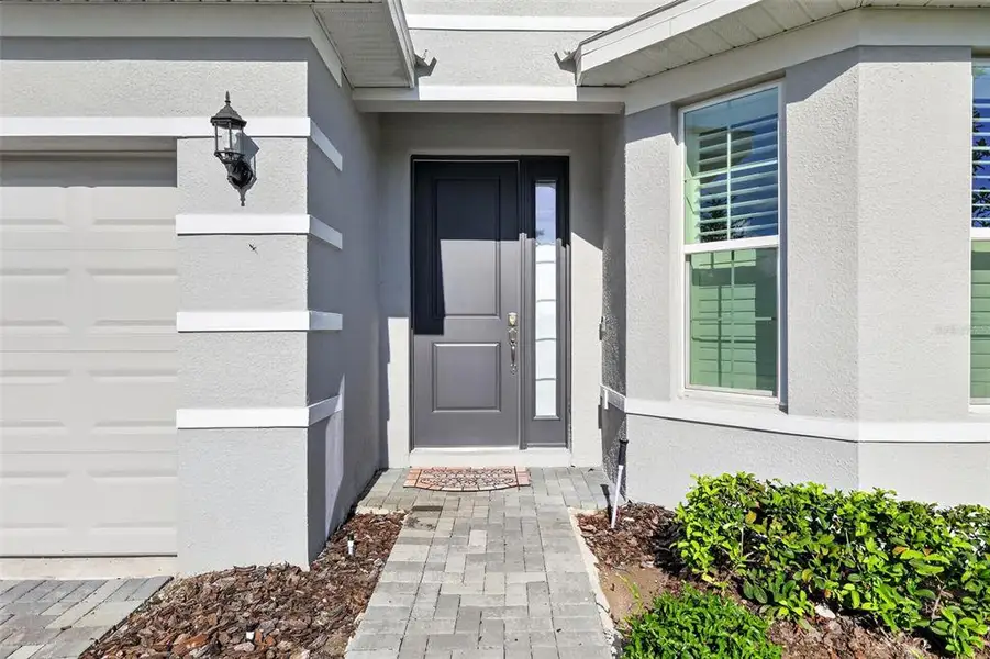 Exterior details and patio area of a home in , Mount Dora (Image 23).