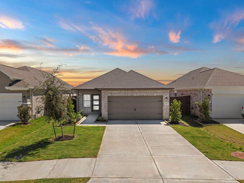 Front exterior of a new home in Creekhaven, Rosharon, TX, highlighting curb appeal (Image 20).