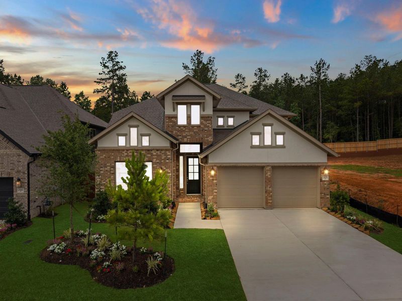 Front exterior of a new home in Wildtree, Magnolia, TX, highlighting curb appeal (Image 23). Front exterior of a new home in Wildtree, Magnolia, TX, highlighting curb appeal (Image 23).
