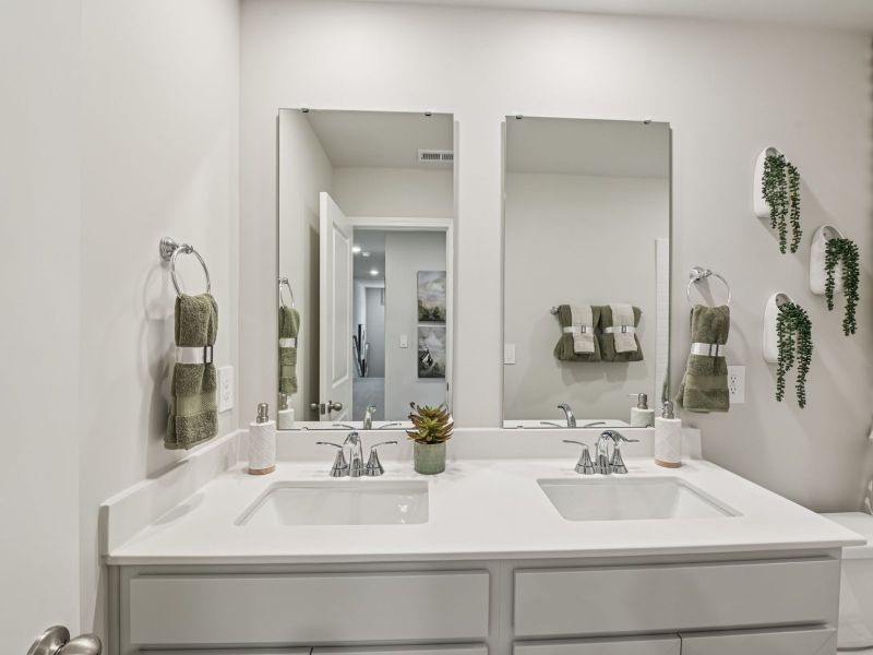 Secondary bathroom in the Chatham floorplan at a Meritage Homes community in Mebane, NC. Secondary bathroom in the Chatham floorplan at a Meritage Homes community in Mebane, NC.