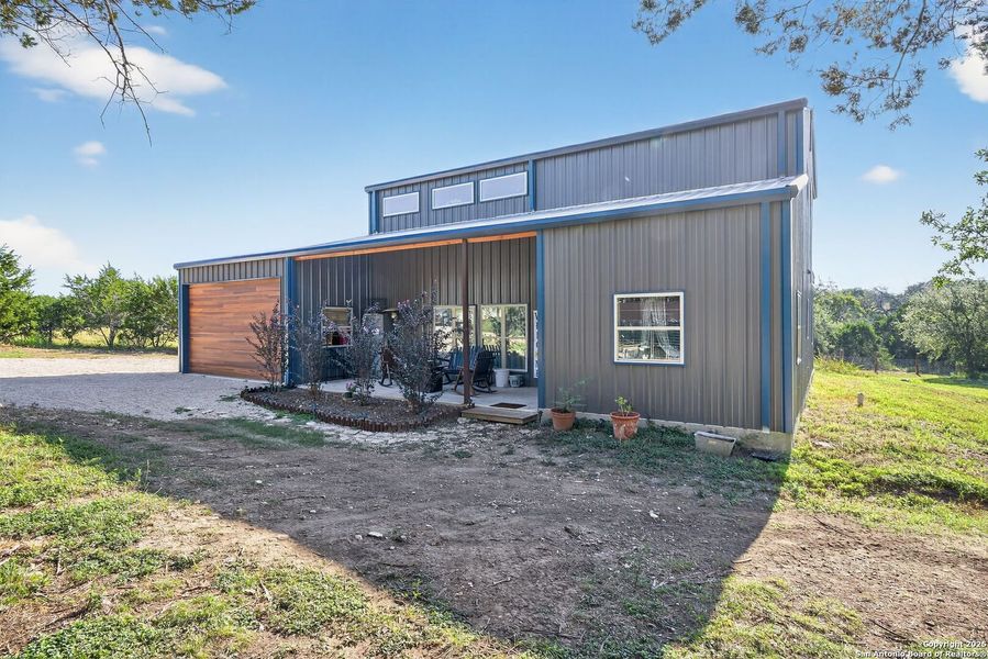 Front exterior of a new home in , Bandera, TX, highlighting curb appeal (Image 21). Front exterior of a new home in , Bandera, TX, highlighting curb appeal (Image 21).
