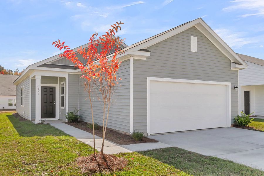 Representative exterior photo of a completed home built from the Atlantis by Starlight Homes in Watson Hill, Summerville, SC (Image 2).