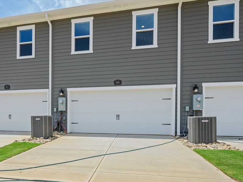 Exterior details and patio area of a home in Hardy Pond Townhomes, Rock Hill (Image 3). Exterior details and patio area of a home in Hardy Pond Townhomes, Rock Hill (Image 3).