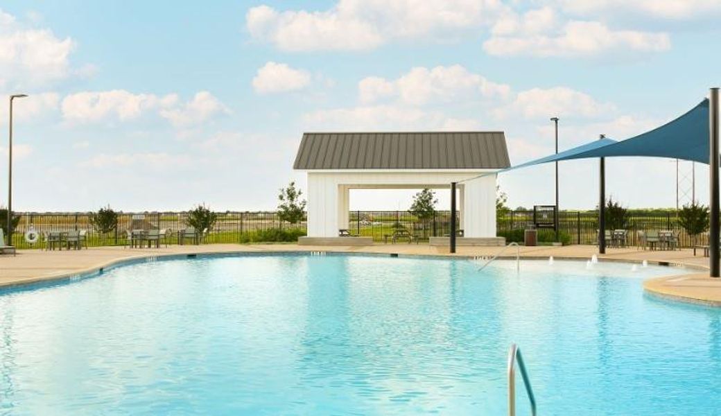 Front exterior of a new home in Casetta Ranch, Kyle, TX, highlighting curb appeal (Image 2). Front exterior of a new home in Casetta Ranch, Kyle, TX, highlighting curb appeal (Image 2).