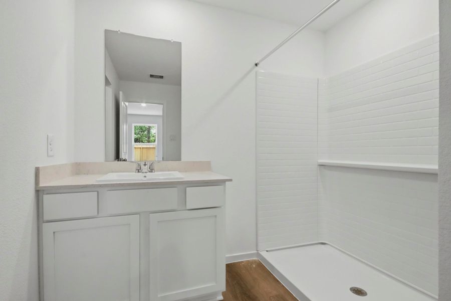 Furnished interior view inside a new home in New Waverly Station, New Waverly (Image 9). Furnished interior view inside a new home in New Waverly Station, New Waverly (Image 9).