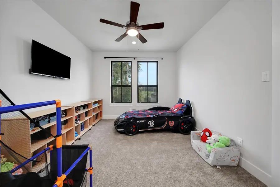 Furnished interior view inside a new home in ARTAVIA, Conroe (Image 29).