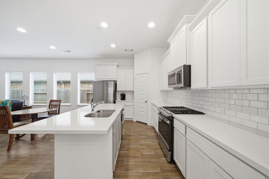 Furnished interior view inside a new home in Artavia, Conroe (Image 12).