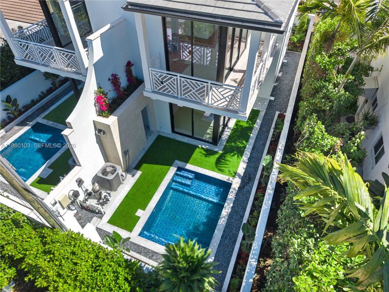 Exterior details and patio area of a home in , Coral Gables (Image 21).