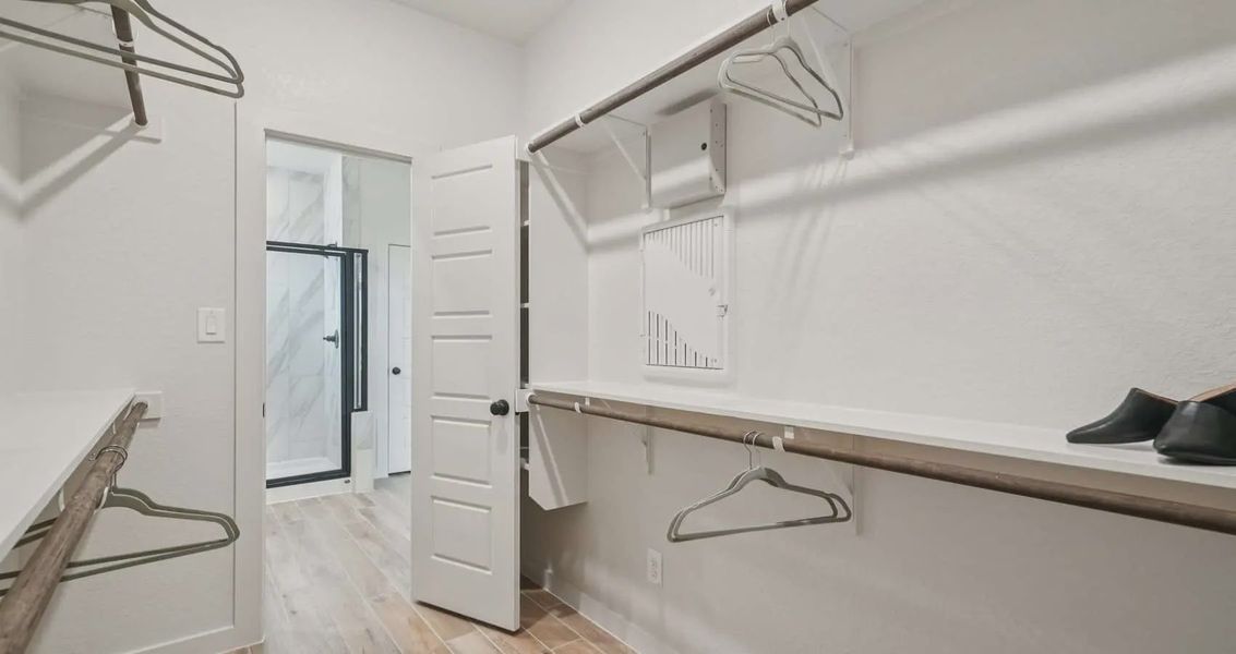 Furnished interior view inside a new home in Stream Waters, Buda (Image 13).