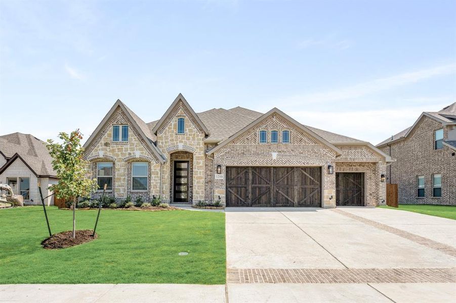 Front exterior of a new home in Villages of Walnut Grove, Midlothian, TX, highlighting curb appeal (Image 1).