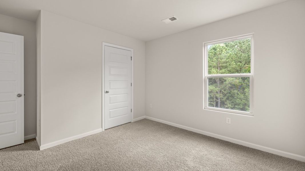 Spacious, unfurnished interior of a new home in Preserve at Dove Creek, Statham (Image 25).