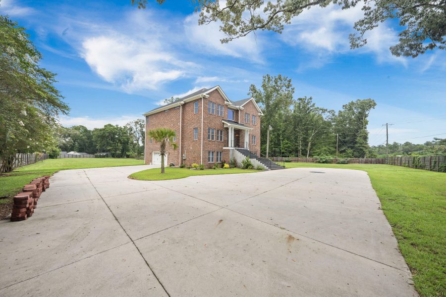 Front exterior of a new home in , Summerville, SC, highlighting curb appeal (Image 35). Front exterior of a new home in , Summerville, SC, highlighting curb appeal (Image 35).