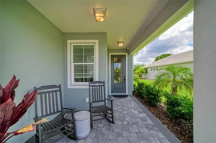 Exterior details and patio area of a home in , Sarasota (Image 3).