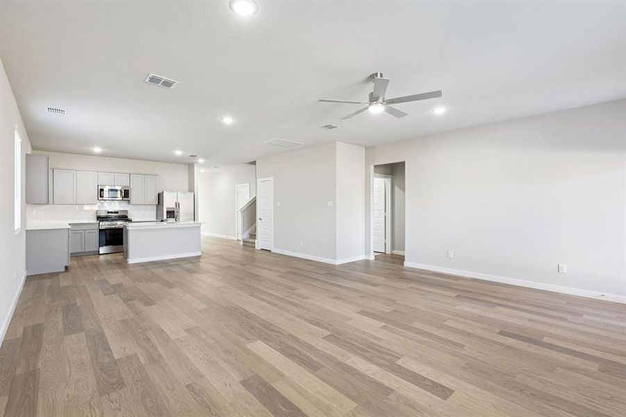 Open First Floor in the Haylee home plan by Trophy Signature Homes - REPRESENTATIVE PHOTO Open First Floor in the Haylee home plan by Trophy Signature Homes - REPRESENTATIVE PHOTO