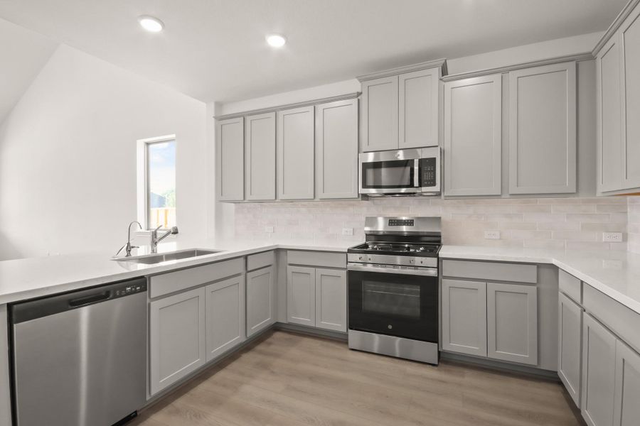 This kitchen is not only a functional space but also has ample storage. Whether you're a seasoned chef or just love to gather and enjoy good food, this kitchen is a dream come true. This kitchen is not only a functional space but also has ample storage. Whether you're a seasoned chef or just love to gather and enjoy good food, this kitchen is a dream come true.