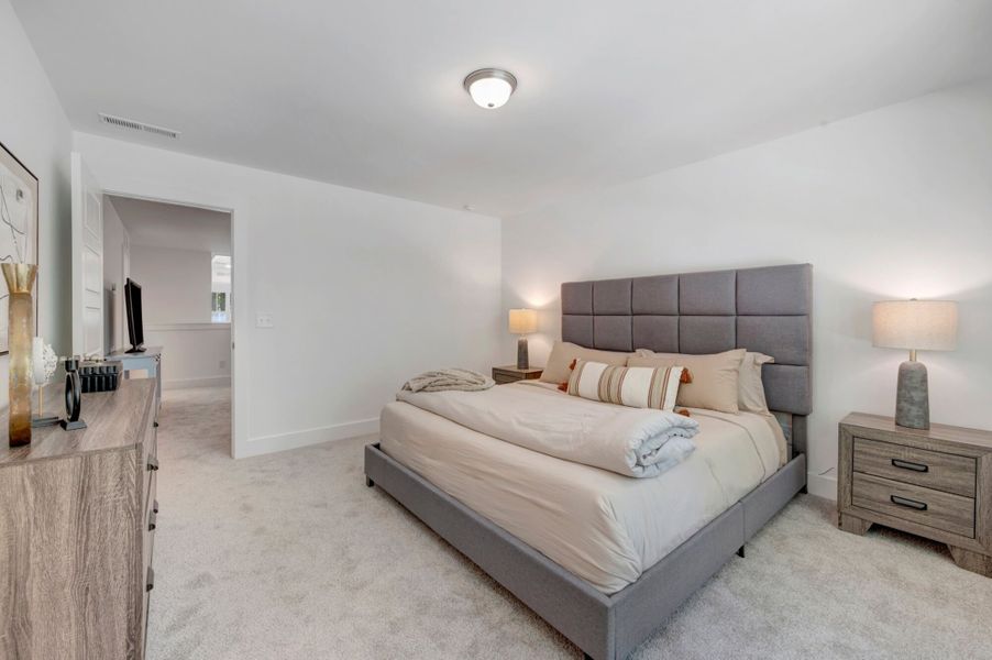 Furnished interior view inside a new home in Ashmore Townes, Garner (Image 17).