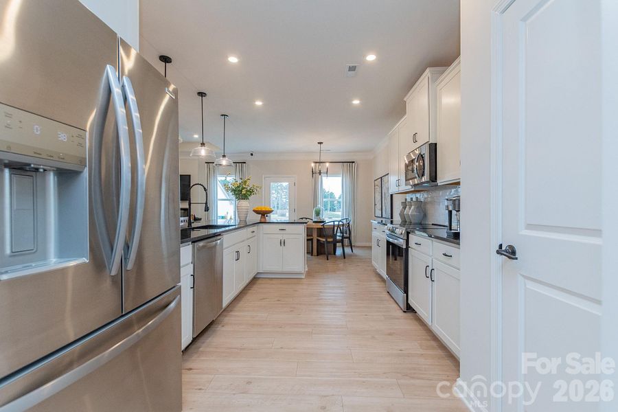 Furnished interior view inside a new home in Pine Bluff, Midland (Image 31).