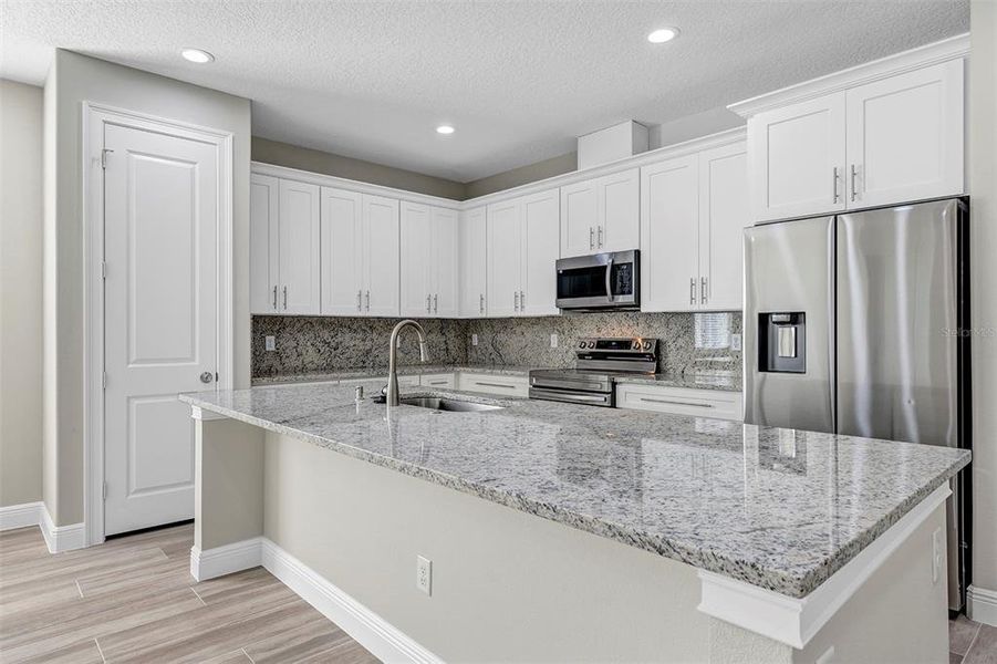 Furnished interior view inside a new home in , Summerfield (Image 13).