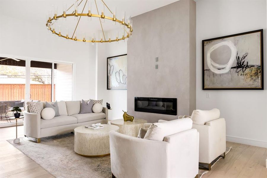 Living Room features Electric Fireplace, Abudance of Natural Light