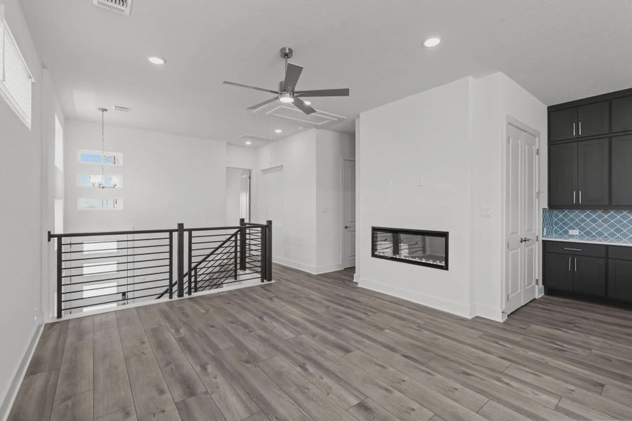 Representative unfurnished interior of a home built from the Athena by Chesmar Homes in Prominence Urban, San Antonio (Image 8).