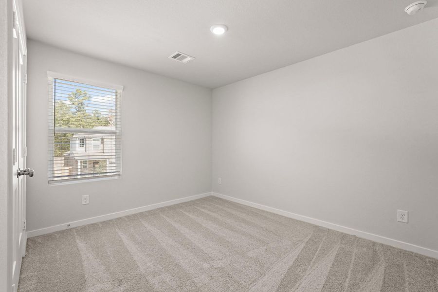 Spacious, unfurnished interior of a new home in Lakes at Black Oak, Magnolia (Image 13).