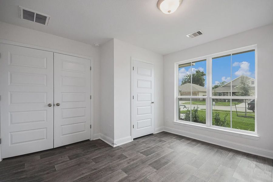 Spacious, unfurnished interior of a new home in Kiber Reserve, Angleton (Image 14). Spacious, unfurnished interior of a new home in Kiber Reserve, Angleton (Image 14).