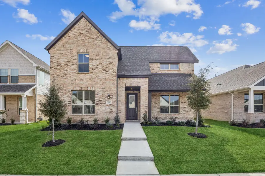 Front exterior of a new home in Dove Hollow, Waxahachie, TX, highlighting curb appeal (Image 19).