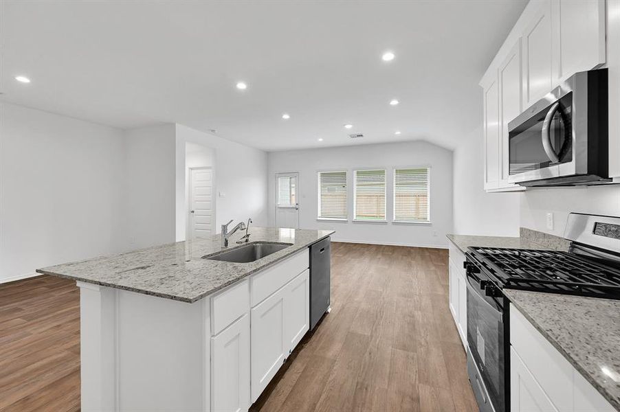 The kitchen area is thoughtfully organized, with each functional zone arranged in a highly practical and efficient layout.