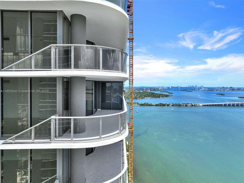 Front exterior of a new home in Aria Reserve, Miami, FL, highlighting curb appeal (Image 2). Front exterior of a new home in Aria Reserve, Miami, FL, highlighting curb appeal (Image 2).