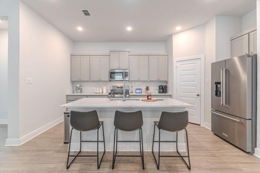 Furnished interior view inside a new home in Grand Central Park, Conroe (Image 6).