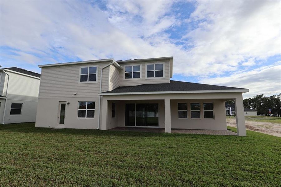 Exterior details and patio area of a home in Solace at Corner Lake, Orlando (Image 30).