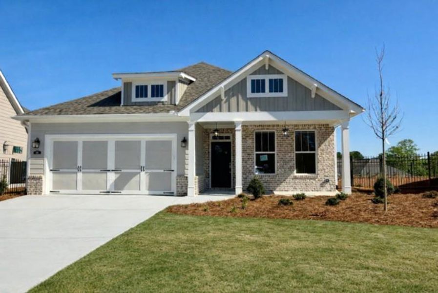 Front exterior of a new home in , Hiram, GA, highlighting curb appeal (Image 21).