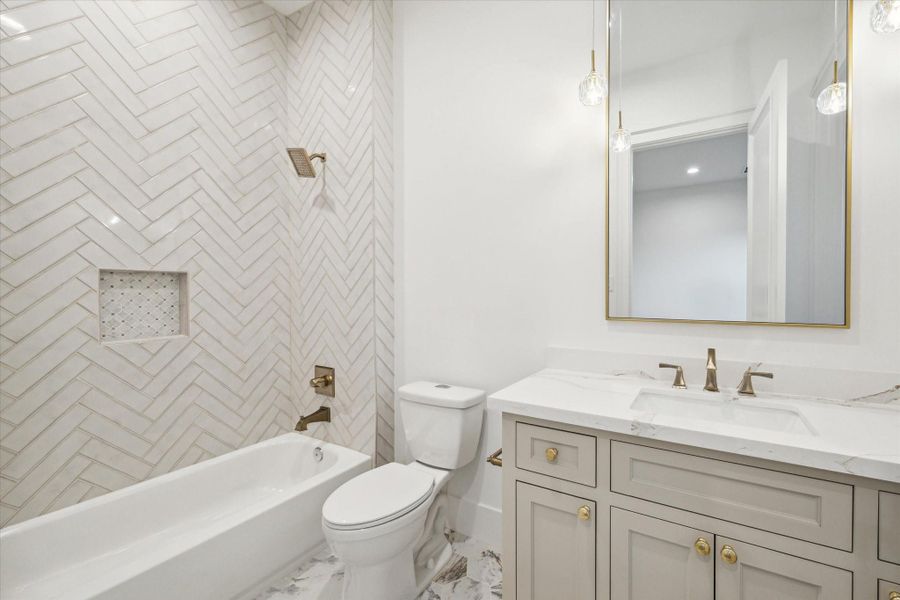 Secondary bedrooms are each appointed with baths en-suite and sizable closets with built-ins*Picture is of a recently constructed home by the builder.  1519 Candlelight will be similar in quality, but these pictures are not meant to be an exact representation of the new home. Specs of home may change at sole discretion of the seller.